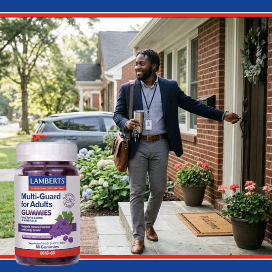 A bottle of Lambert's Multi-Guard for Adults Gummies is shown in the foreground, while a lifestyle photo in the background depicts a man in a suit walking open a front door of a brick house.