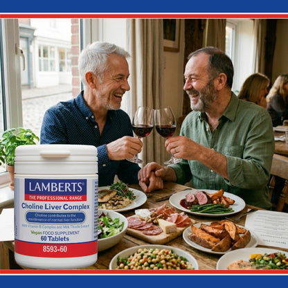 Two men enjoying a meal together with a container of Lamberts Choline Liver Complex supplement in the foreground.