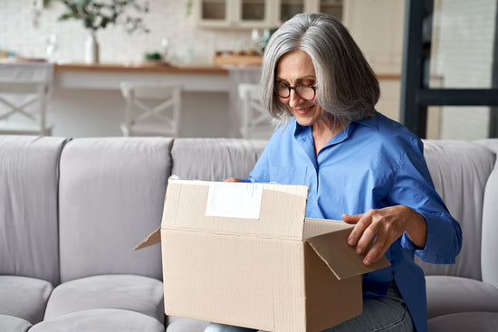 Women opening a package