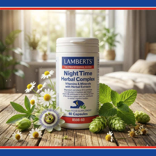 Lambert's Night Time Herbal Complex supplement bottle on a wooden surface with herbs and flowers.