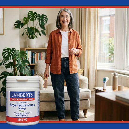 Woman standing in a living room with a Lamberts supplement container in the foreground