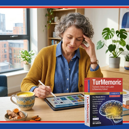 Woman using a tablet with a Turmeric product box on a table