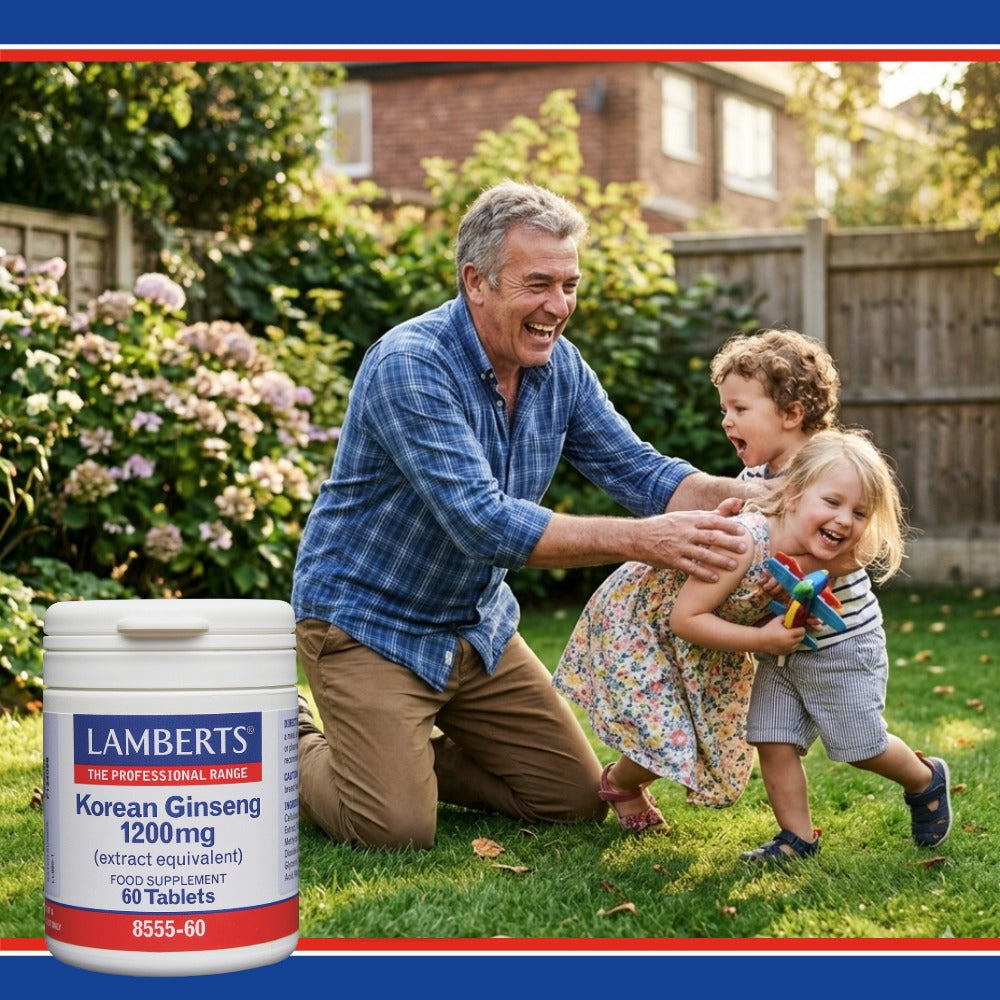 Man playing with children in a garden with a Lamberts Korean Ginseng supplement container in the foreground.