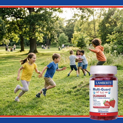 Children playing in a park with a bottle of Lamberts Multi-Guard for Kids Gummies in the foreground.