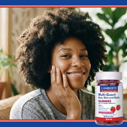 Woman with a bottle of Lamberts Multi-Guard Hair, Skin and Nails Gummies