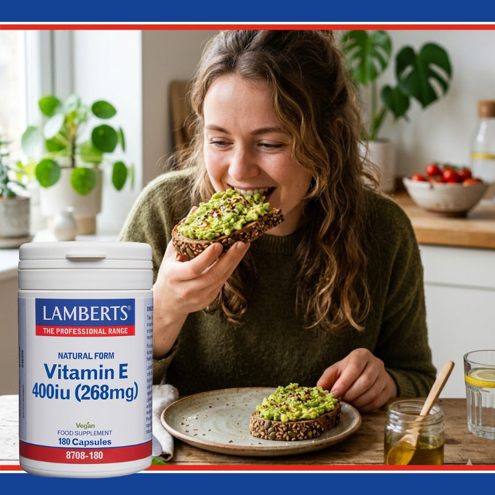 Woman eating avocado toast with a container of Lamberts Vitamin E supplement in the foreground.